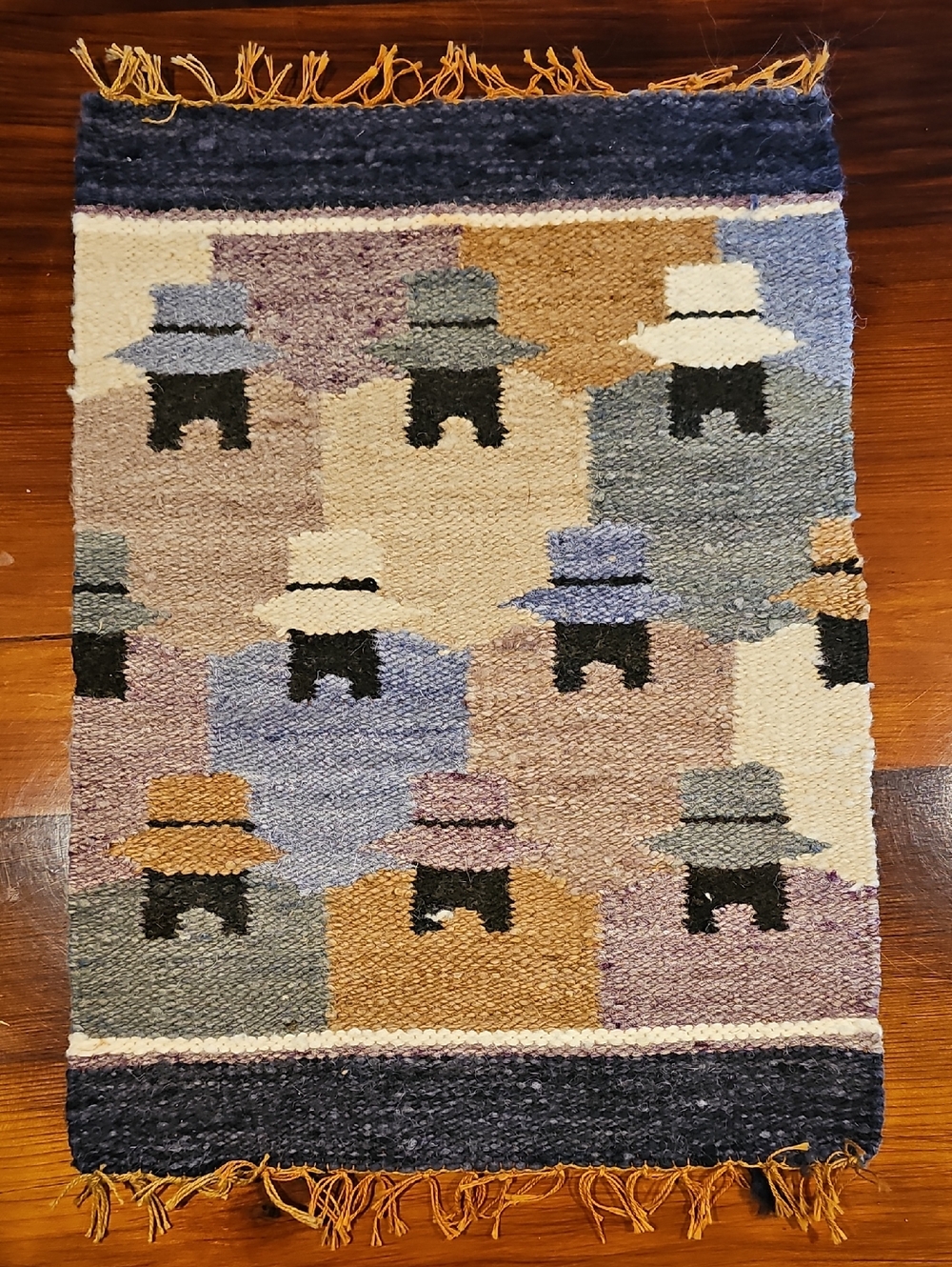 Small Handwoven Ecuador Geometric Rug with Hat Motif in Blue, Tan, Cream